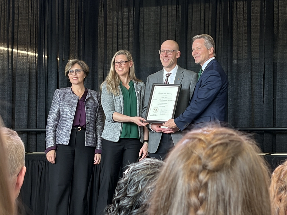 MSU Trustee Rebecca Bahar-Cook, Provost Laura Lee McIntyre, Beal award recipient Kevin Elliott, and President Kevin Guskiewicz